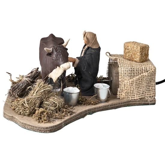Uomo che munge mucca serie 10 cm in movimento per presepe Mondo