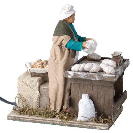 Donna che impasta serie 15 cm in movimento per presepe Mondo