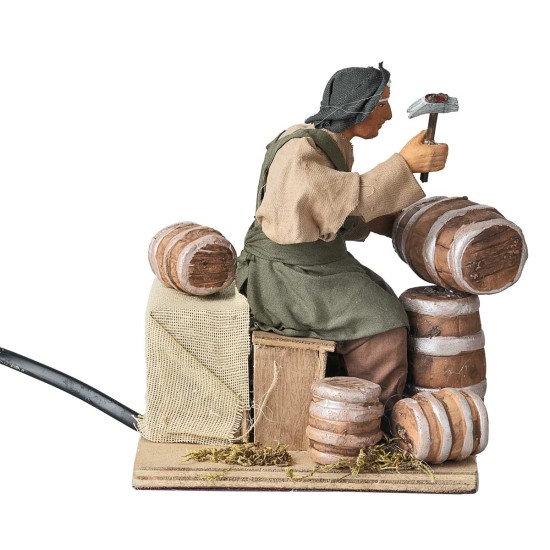 Man fixing barrels series 14 cm in motion for nativity scene