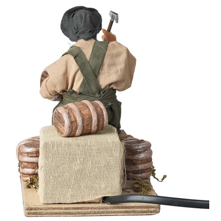 Hombre que arregla barriles serie 14 cm en movimiento para belén