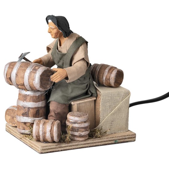 Hombre que arregla barriles serie 14 cm en movimiento para belén