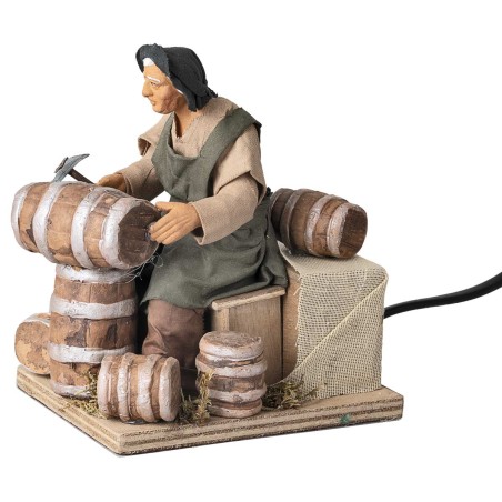 Hombre que arregla barriles serie 14 cm en movimiento para belén