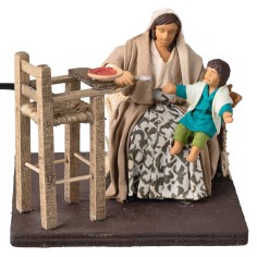 Mamá que da de comer al niño serie 12 cm en movimiento