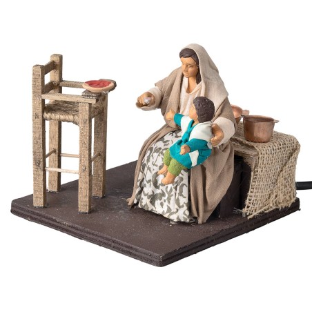 Mamá que da de comer al niño serie 12 cm en movimiento