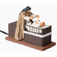 Mother taking baby from cradle series 12 cm in motion for 2