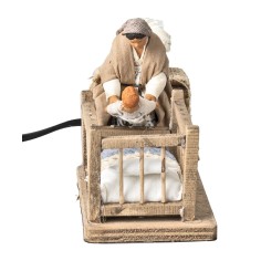 Mom taking baby from the cradle series 10 cm in motion for 2