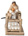 Mom taking baby from the cradle series 10 cm in motion for