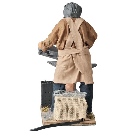 Fabbro con con effetto fuoco 24 cm in movimento per presepe