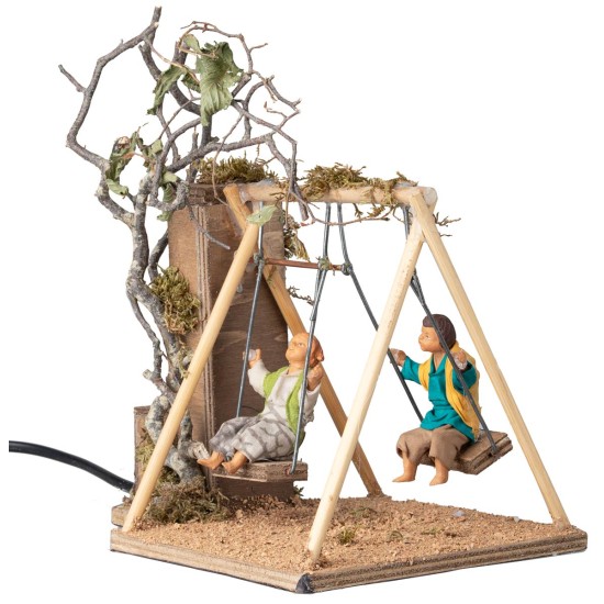 Pair of children on a swing cm 14 in motion for nativity scene