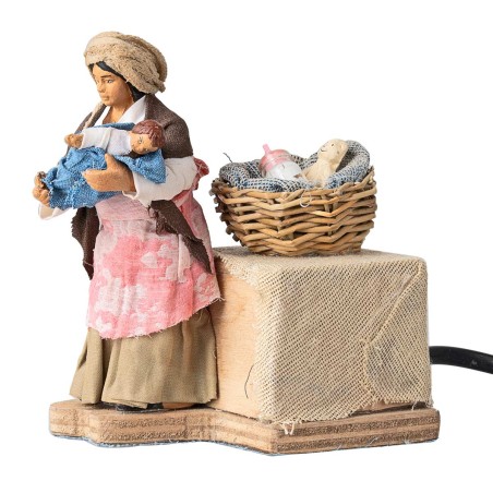 Mother cradling baby in arms 10 cm in motion for nativity scene
