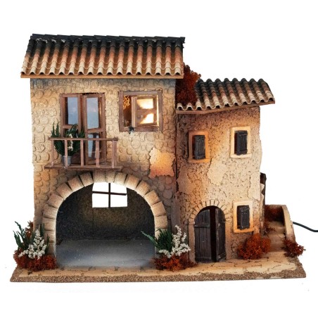 Borgo illuminato con donna in movimento cm 50x30x41.5 h