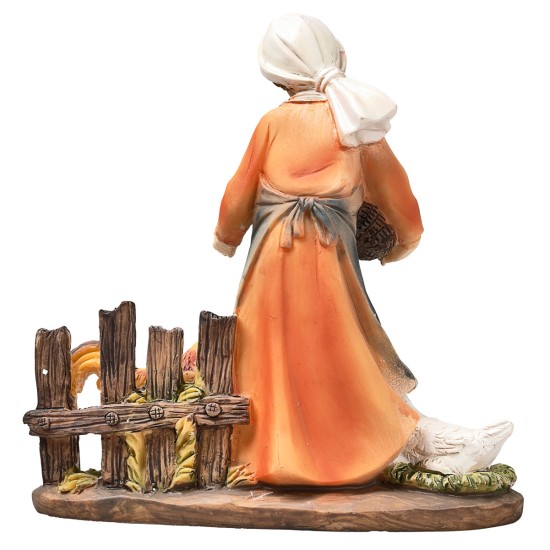 Resin peasant woman feeding chickens for Mondo Nativity scene