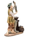 copy of Farmer Woman in resin feeding the chickens for nativity scene