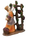 Donna che raccoglie l'uva in resina per presepe Mondo Presepi