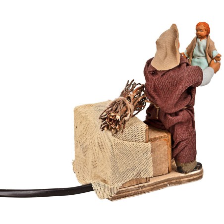 Uomo che alza bambino in movimento 10 cm per presepe Mondo