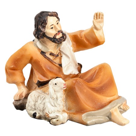 Pastore sdraiato con pecora serie 9 cm in resina per presepe