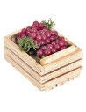Miniature wooden crate with bunches of grapes.