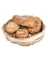 Low wicker basket with assorted miniature rolls for
