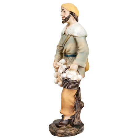Uomo con ceppi d'aglio 15 cm in resina per presepe Mondo Presepi