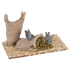 Mice eating legumes from jute sack for Nativity scene World