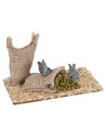 Mice eating legumes from jute sack for Nativity scene World