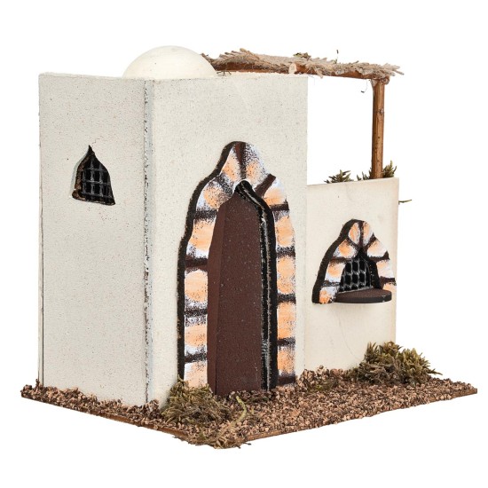 Casa árabe de dos pisos con terraza y portal arqueado, cm