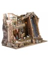 Illuminated nativity scene with steep waterfall and Landi