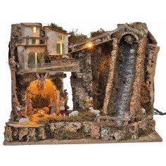 Illuminated nativity scene with steep waterfall and Landi 2