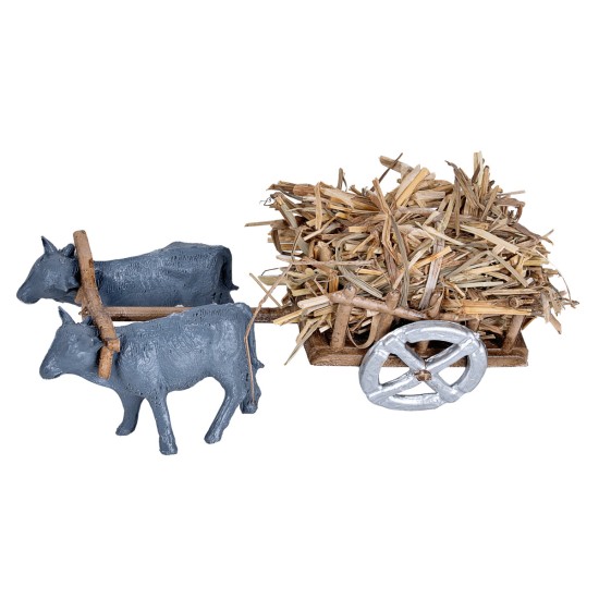 Carreta con bueyes cargada de paja para pesebre