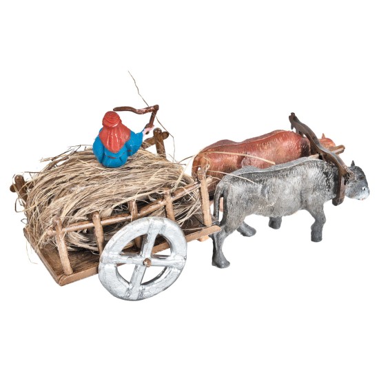 Cart with oxen and farmer loaded with straw for nativity scene