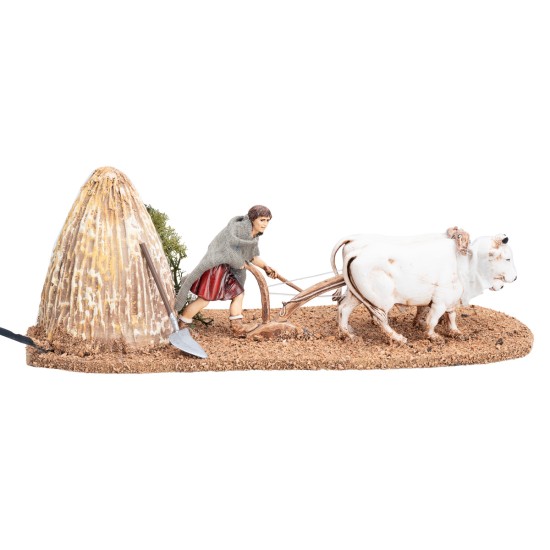 Farmer with oxen and plow in motion 10 cm for nativity scene