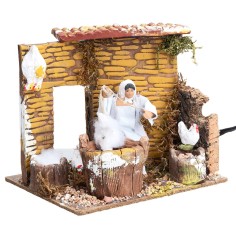 Mujer con gallinas 10 cm en movimiento cm 17x14x14,5 h