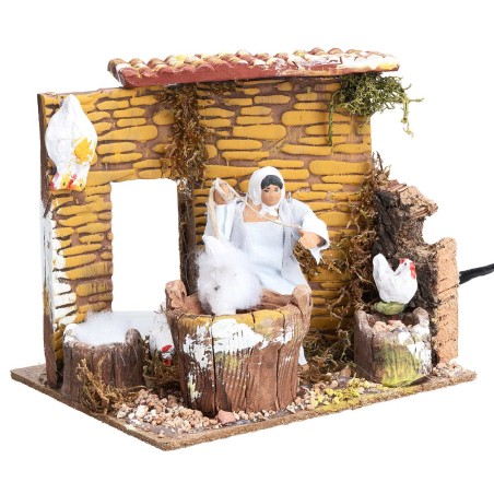 Donna con galline 10 cm in movimento cm 17x14x14,5 h