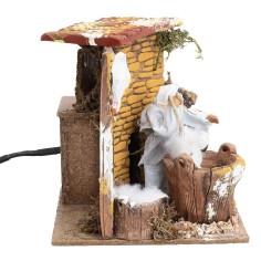 Donna con galline 10 cm in movimento cm 17x14x14,5 h 2