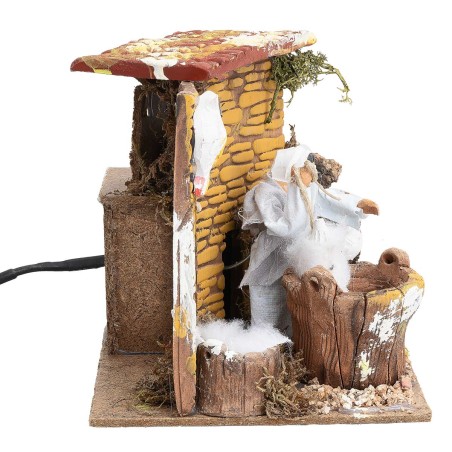 Donna con galline 10 cm in movimento cm 17x14x14,5 h