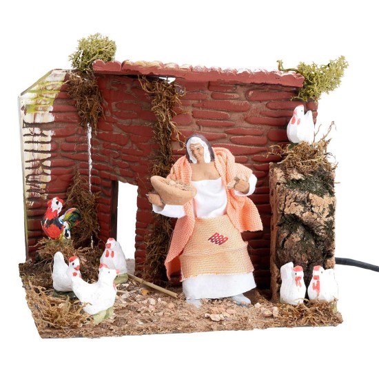 Contadina con galline 10 cm in movimento cm 17x14x14 h