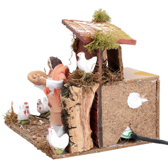 Campesina con gallinas 10 cm en movimiento cm 17x14x14 h