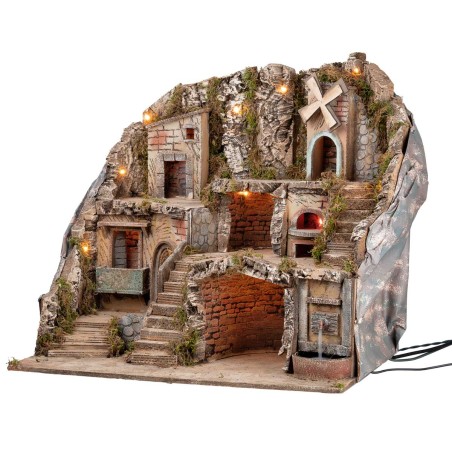 Illuminated nativity scene with fountain, fire, and windmill cm