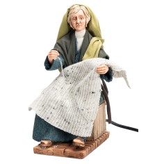 Donna in stile arabo che cuce con doppio movimento serie 30 cm