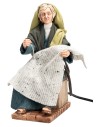 Donna in stile arabo che cuce con doppio movimento serie 30 cm