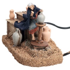 Donna al tornio serie 10 cm in movimento per presepe Mondo