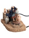 Donna al tornio serie 10 cm in movimento per presepe Mondo