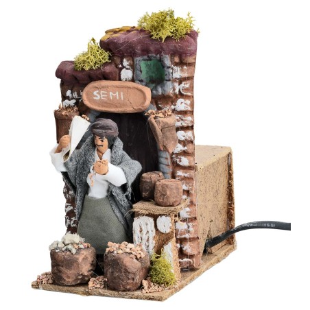Venditore di semi 10 cm in movimento per presepe Mondo Presepi
