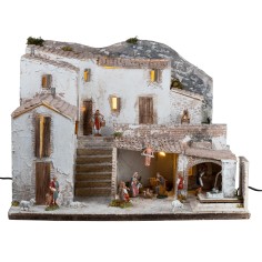 Nativity scene with Landi statues, lights, and working fountain