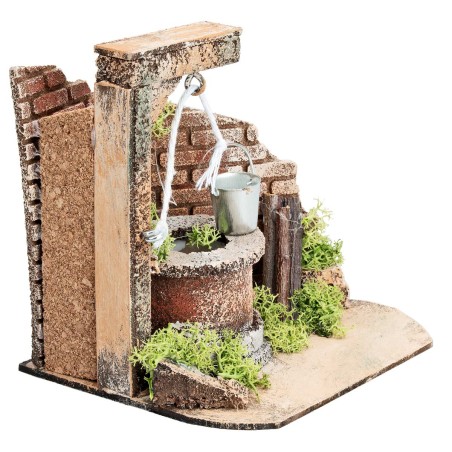 Well with bucket and side brick wall for statues from