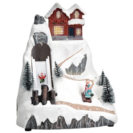 Moving Christmas Village complete with light and music for