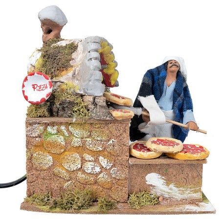 Pizza maker with 14 cm oven in motion with working light for