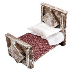 Letto con coperta in legno cm 6,5x4x5,3h per presepe Mondo 2