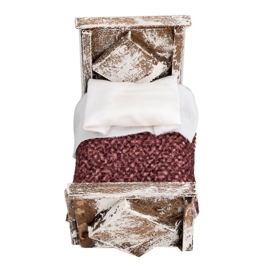 Letto con coperta in legno cm 6,5x4x5,3h per presepe Mondo