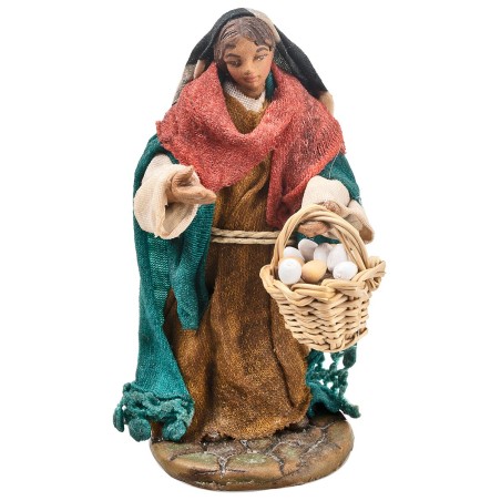 Mujer con cesta 9-10 cm en terracota con ropa de tela para